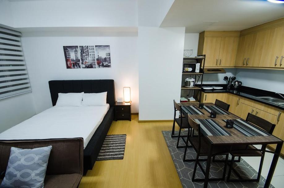 Prime Avant Bgc Location Apartments By Ph Staycation 马尼拉 外观 照片